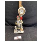 Battery operated porcelain fireman clock