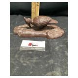 Cast-iron woodpecker door knocker