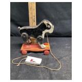 Hustler toy corporation dog pull along