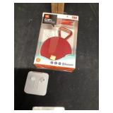 Apple headphones and Bluetooth speaker