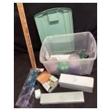 Rubbermaid tote of candles with new accessories