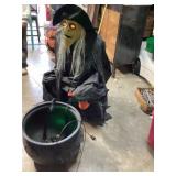 Halloween decor which with cauldron approximately