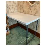 Folding 4 foot adjustable height table