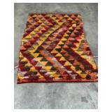 Woven / fur rug