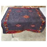 Woven throw rug