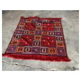 Woven throw rug