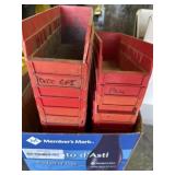 Red plastic organizing parts bins