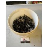 Bucket of Hose Clamps