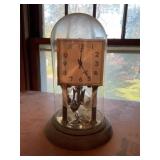Clock with brass base
