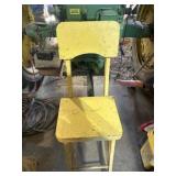 Yellow wooden stool