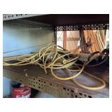 Shelf of Drop Cords and Work Light