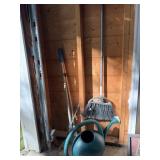 Water can, dog scoop, broom, and dustpan