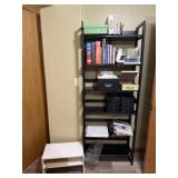 Folding shelf full of office supplies