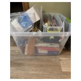 Tote of office supplies