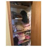 Closet full of towels and misc