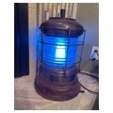 Vintage nautical lantern with wooden base