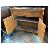 Wood storage cabinet