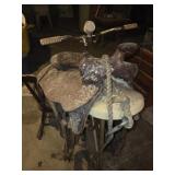 Vintage stationary bicycle and saddle