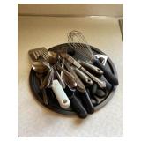Assorted kitchen utensils and pizza pan