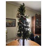 Tabletop Christmas tree and box. Ornaments