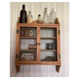 Wall shelf and vintage bottles