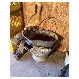 Vintage wringer and ash buckets