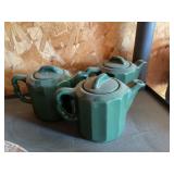 Three small teapots