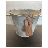 Galvanized pail and cattle kickers