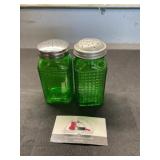 Green glass salt and pepper shakers