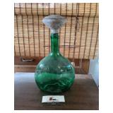 Vintage green bottle with sprinkler top