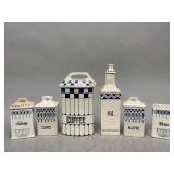 Damaged Canisters with Cobalt Blue