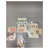 Assortment of used and unused stamps