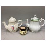 One pitcher and two teapots