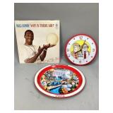 An album, a tray and a clock