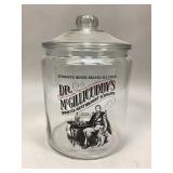Vintage glass advertising jar