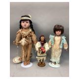 Three Native American style dolls