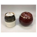 Possibly a McCoy cookie jar & a stoneware crock