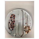 Nine assorted necklaces
