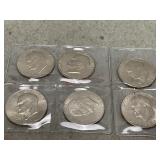 Six Ike Dollar Coins