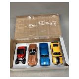 Four Maisto 1:24 Scale Muscle Cars