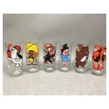 Six M-G-M & Warner Bros. Collectors Glasses