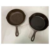 Two Number 5 Cast Iron Skillets