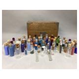 Assorted Glass Bottles Filled with Various Beads