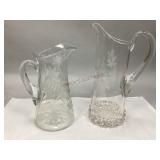 Two Clear Etched Glass Pitchers