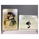 Two Metal Advertisement Signs