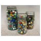 Three Glass Jars of Marbles