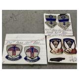 Three Sets of Unit Badges