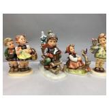 Four Collectible M.I.Hummel Figurines