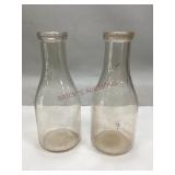 Two Vintage Lewis Dairies Inc. Milk Bottles