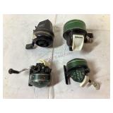 Four Johnson Button Fishing Reels